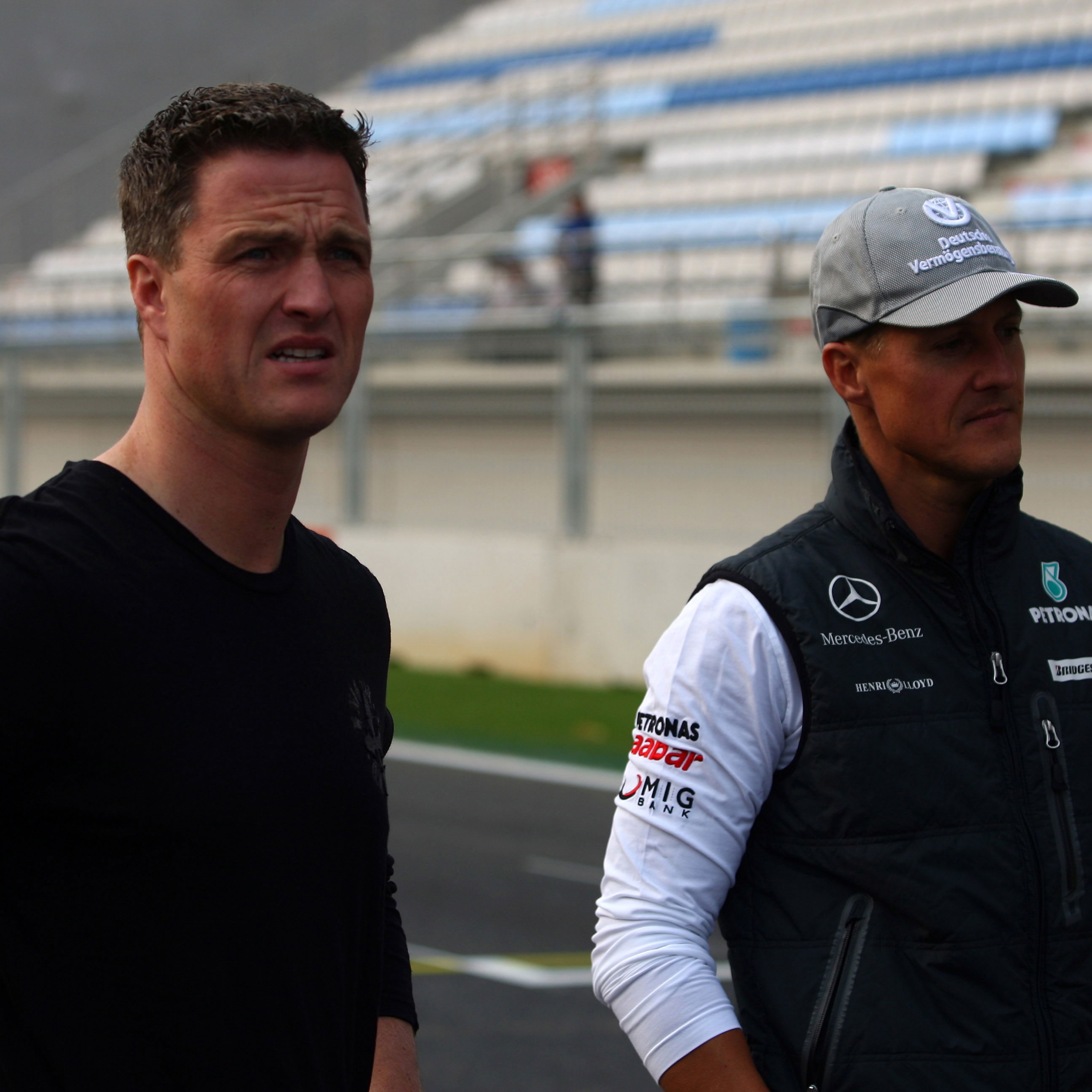 Thursday, Ralf Schumacher (GER) and Michael Schumacher (GER), Mercedes GP F1 Team, MGP W01