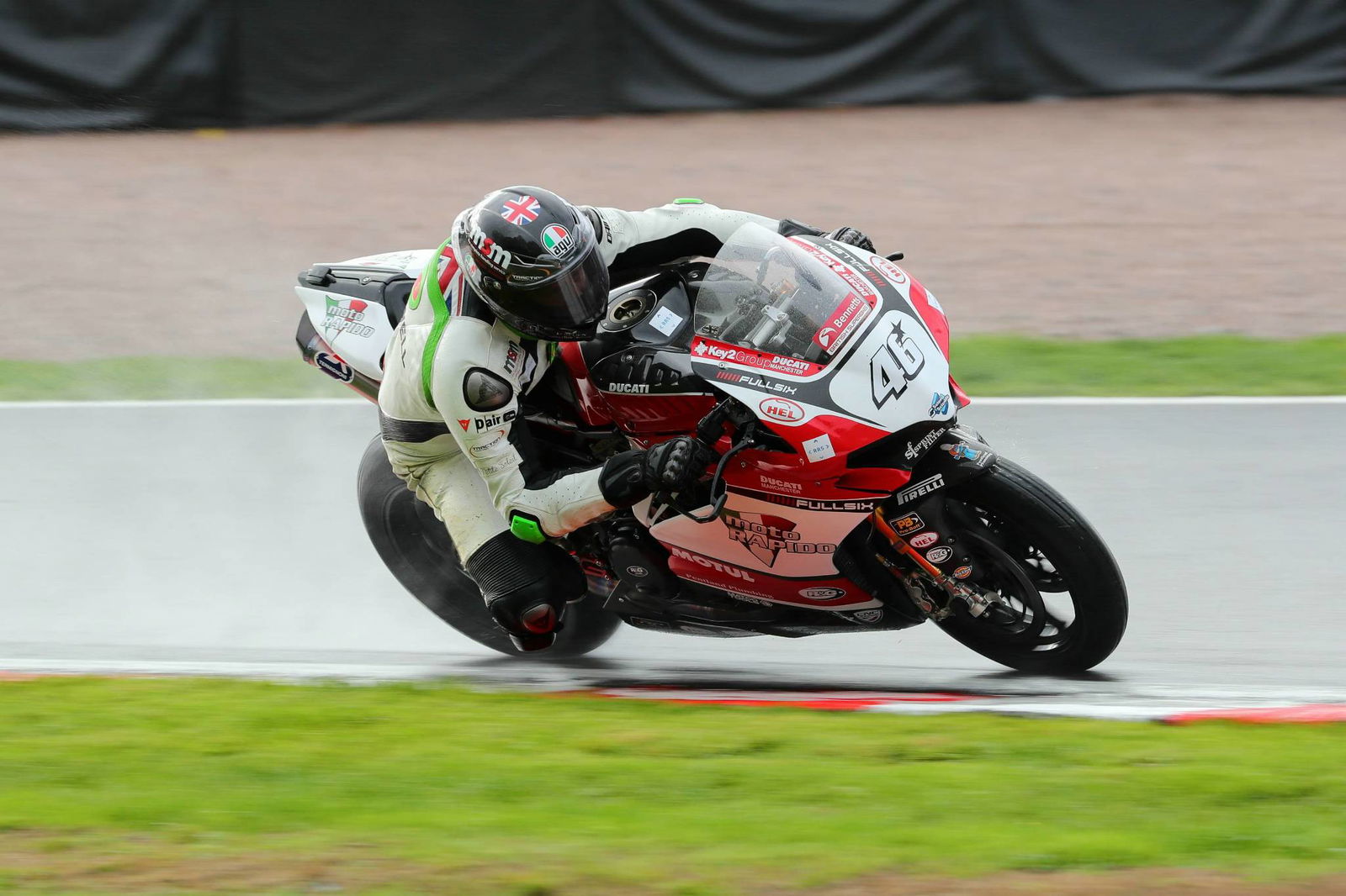Dixon stays top in rain-interrupted FP2