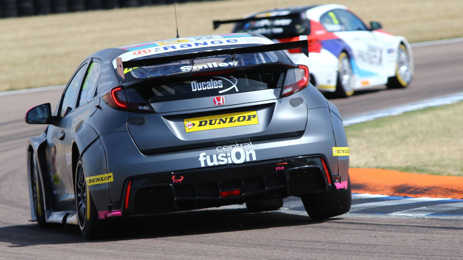 Smiley takes maiden BTCC win in chaotic third race
