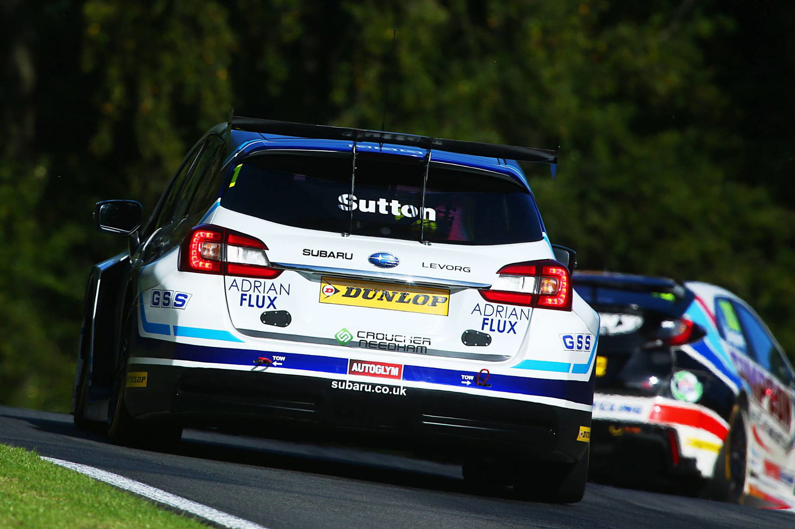 Sutton beats Cook in photo-finish for finale win