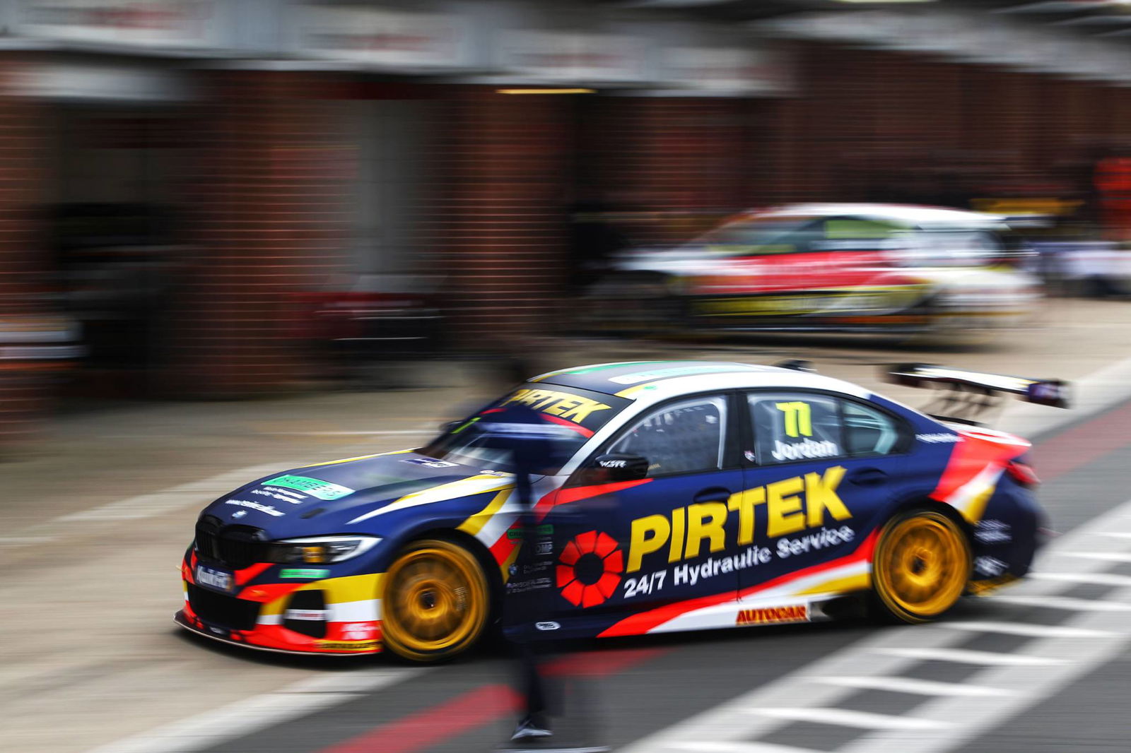 Cook claims victory in thrilling season opener