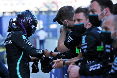 Lewis Hamilton (GBR) Mercedes AMG F1 celebrates with the team in parc ferme.