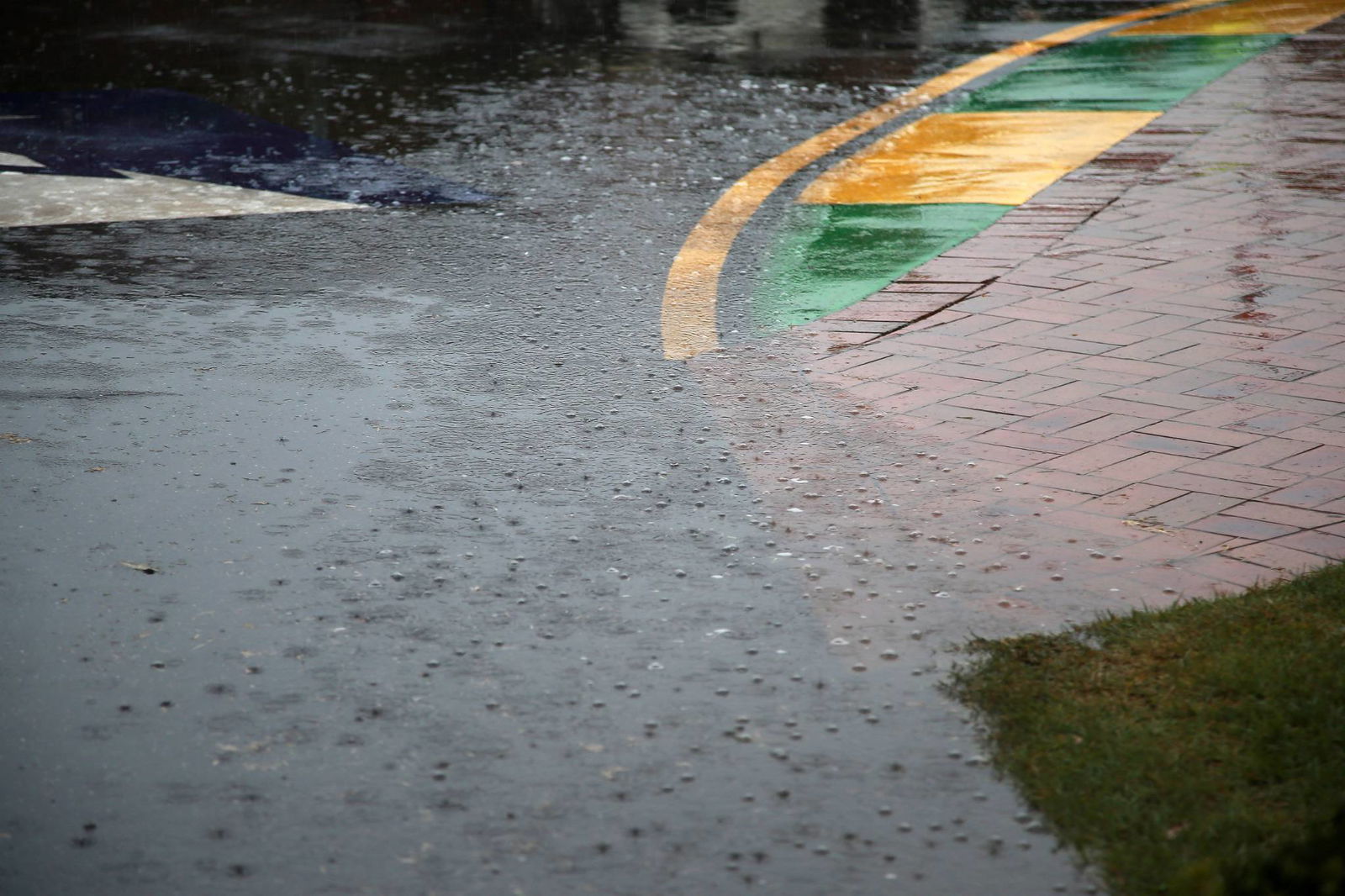 Vettel leads Ferrari one-two in wet-dry FP3