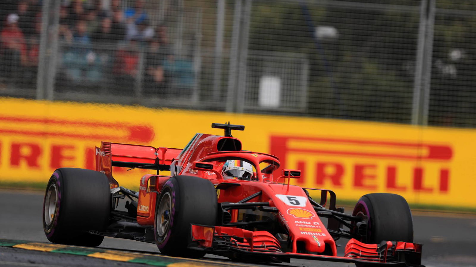 Vettel leads Ferrari one-two in wet-dry FP3