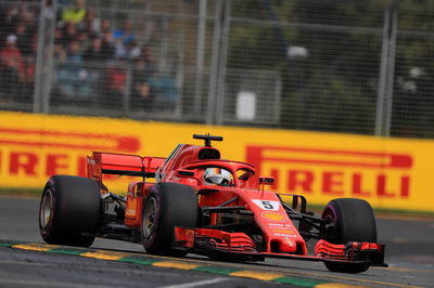 Vettel leads Ferrari one-two in wet-dry FP3