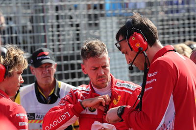 Vettel “confused” by F1 race start switch, grid girl drops