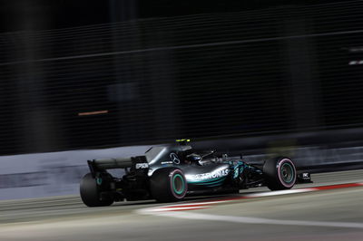 Hamilton predicts three-way fight in Singapore