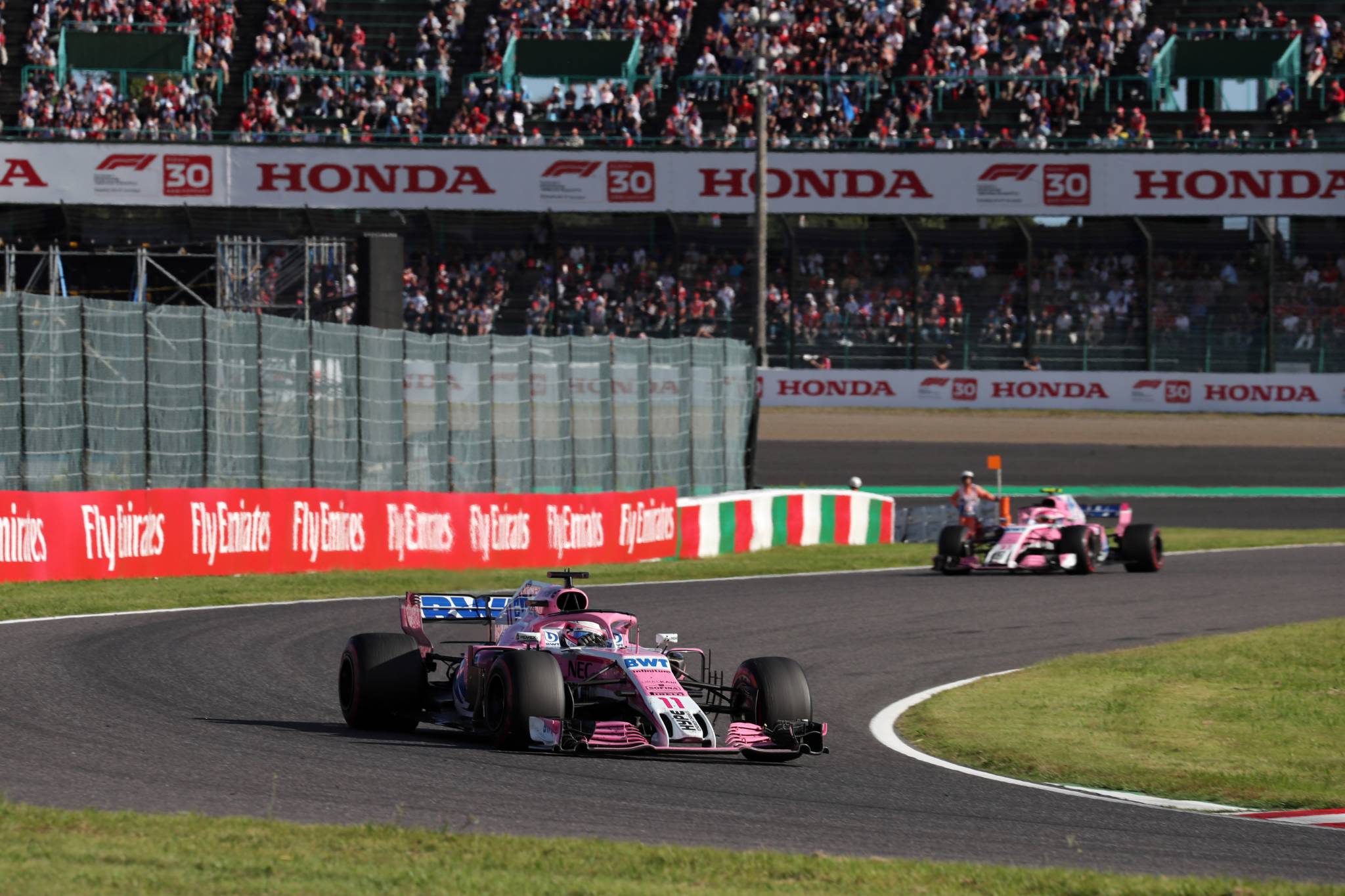 07.10.2018 - Race, Sergio Perez (MEX) Racing Point Force India F1 VJM11 leads Esteban Ocon (FRA) Racing Point Force India F1 VJM11