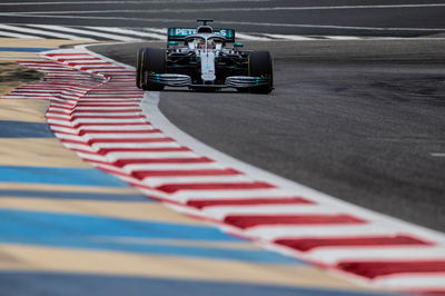 Surprise rain curtails Mercedes test for Hamilton