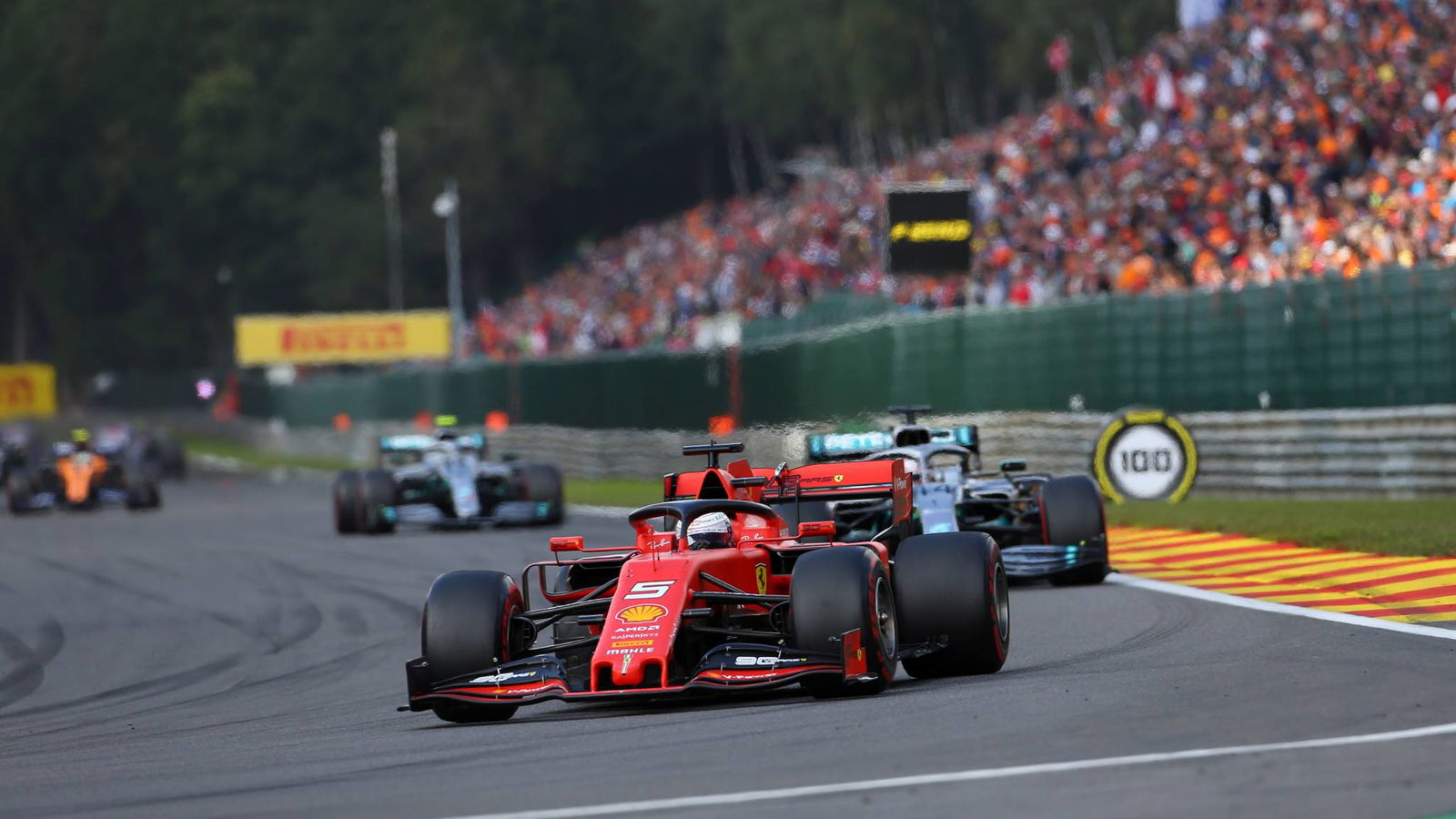 Vettel happy to “serve” Ferrari by holding Hamilton up