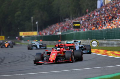 Vettel happy to “serve” Ferrari by holding Hamilton up