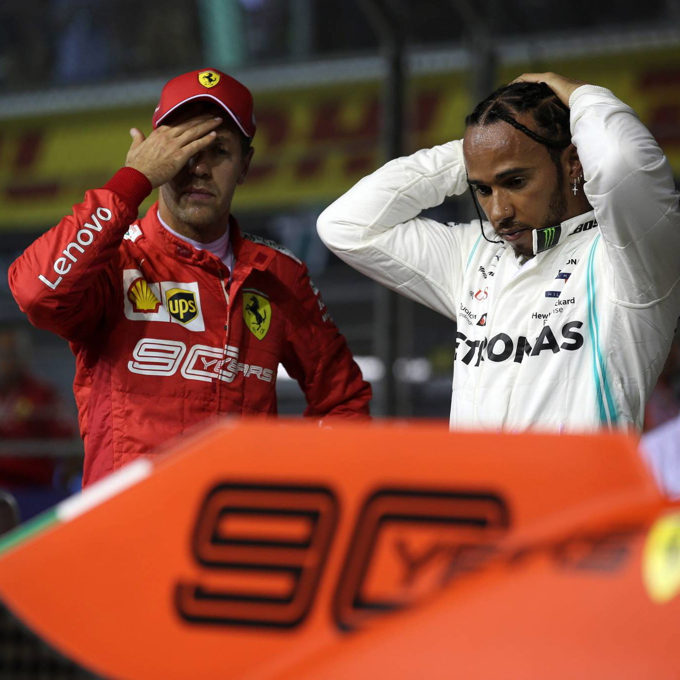 FIA examines Fisi's Spa helmet.