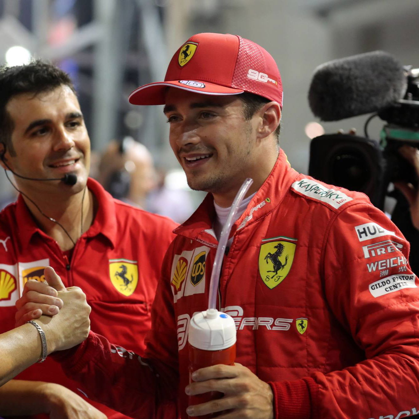 FIA examines Fisi's Spa helmet.