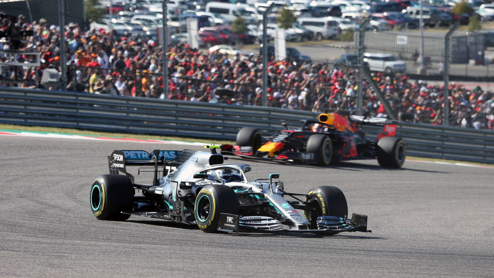 Bottas makes late pass for US GP victory as Hamilton clinches title