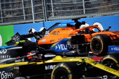 Carlos Sainz Jr (ESP) McLaren MCL35 with a broken rear wing.