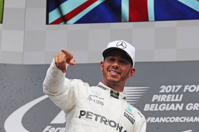 Hamilton soaks up Vettel pressure for Belgian GP victory