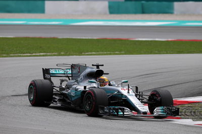 Hamilton takes Malaysia F1 pole as disaster strikes Vettel