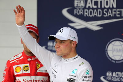 Bottas pleased to deliver on pole promise in Brazil after Mercedes gunpoint robbery