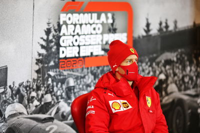 Sebastian Vettel (GER) Ferrari in the FIA Press Conference.