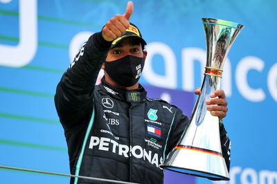 Race winner Lewis Hamilton (GBR) Mercedes AMG F1 celebrates on the podium.