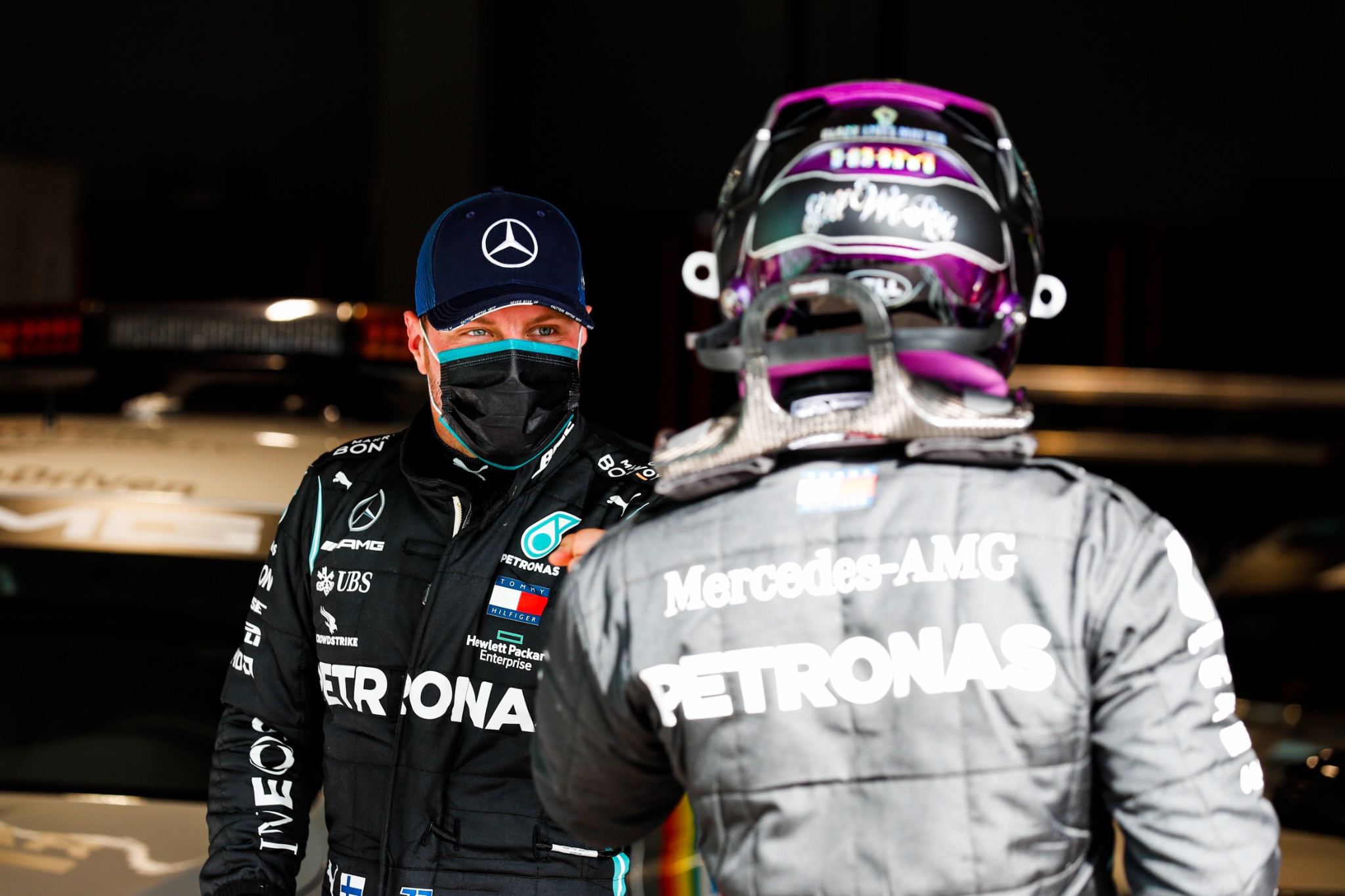 (L to R): Valtteri Bottas (FIN) Mercedes AMG F1 with team mate Lewis Hamilton (GBR) Mercedes AMG F1 in qualifying parc ferme.