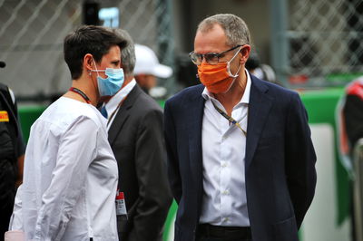 (L to R): Ellie Norman, F1 Director of Marketing and Communications with Stefano Domenicali (ITA) on the grid.