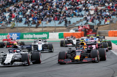 Pierre Gasly (FRA) AlphaTauri AT01 and Alexander Albon (THA) Red Bull Racing RB16 at the start of the race.