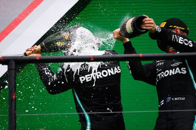 Race winner Lewis Hamilton (GBR) Mercedes AMG F1 celebrates on the podium with Valtteri Bottas (FIN) Mercedes AMG F1.