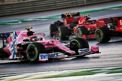 Lance Stroll (CDN) Racing Point F1 Team RP20 and Sebastian Vettel (GER) Ferrari SF1000 battle for position.