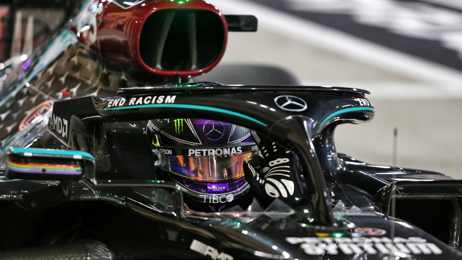 Lewis Hamilton (GBR) Mercedes AMG F1 W11 celebrates his pole position in qualifying parc ferme.