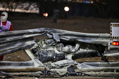 The heavily damaged Haas F1 Team VF-20 of Romain Grosjean (FRA) Haas F1 Team after crashed at the start of the race and exploded into flames, destroying the armco barrier.