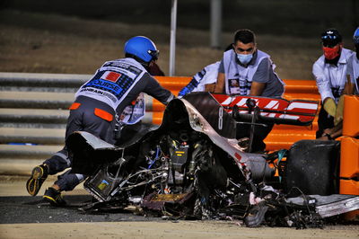 The heavily damaged Haas F1 Team VF-20 of Romain Grosjean (FRA) Haas F1 Team after crashed at the start of the race and exploded into flames, destroying the armco barrier.