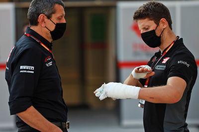 (L to R): Guenther Steiner (ITA) Haas F1 Team Prinicipal with Romain Grosjean (FRA) Haas F1 Team.