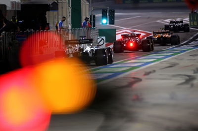 George Russell (GBR) Mercedes AMG F1 W11 ahead of Daniil Kvyat (RUS) AlphaTauri AT01.