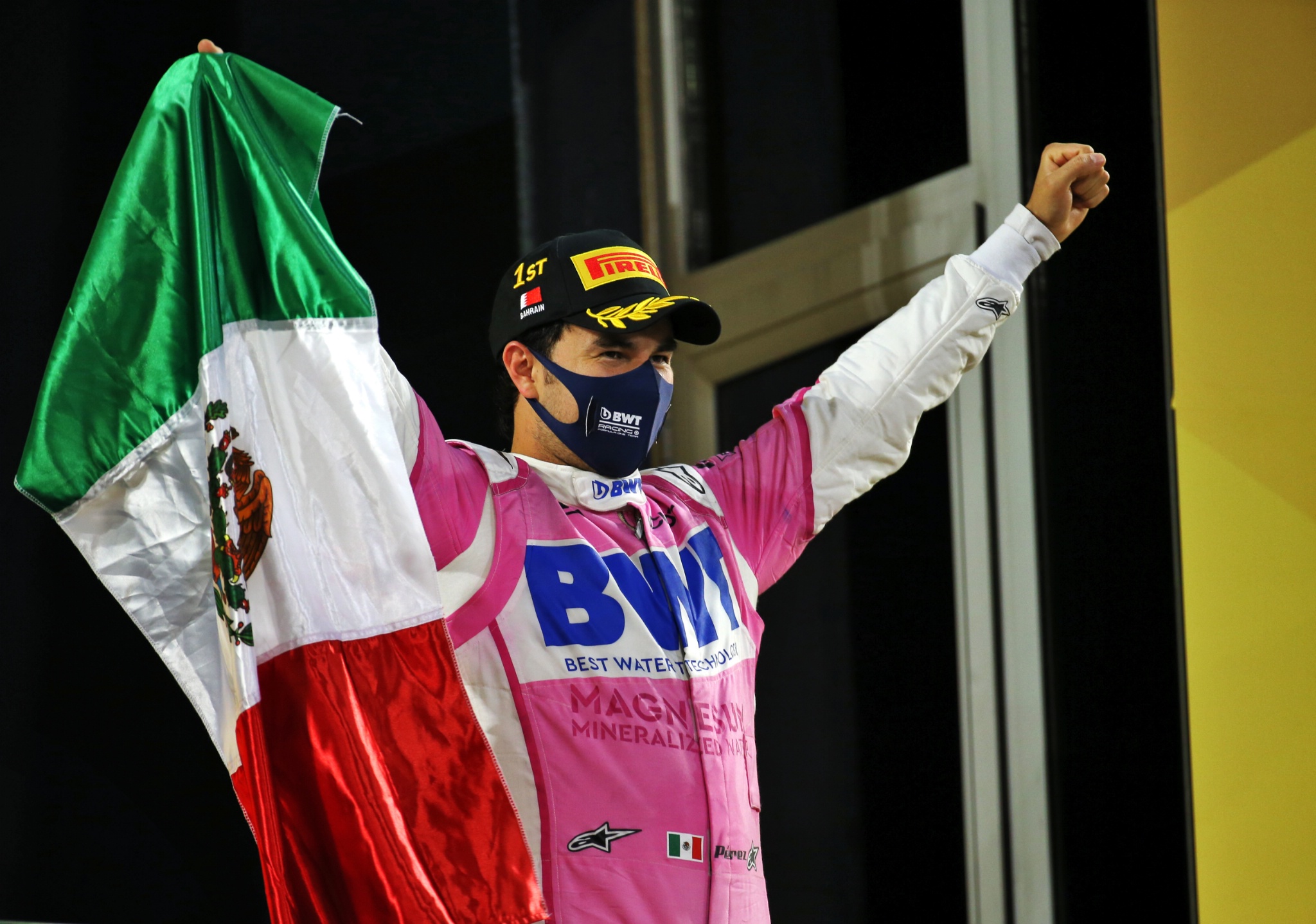 Race winner Sergio Perez (MEX) Racing Point F1 Team celebrates on the podium.