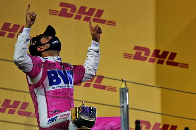 Race winner Sergio Perez (MEX) Racing Point F1 Team celebrates on the podium.