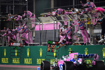 Race winner Sergio Perez (MEX) Racing Point F1 Team RP19 celebrates as he passes the team at the end of the race.