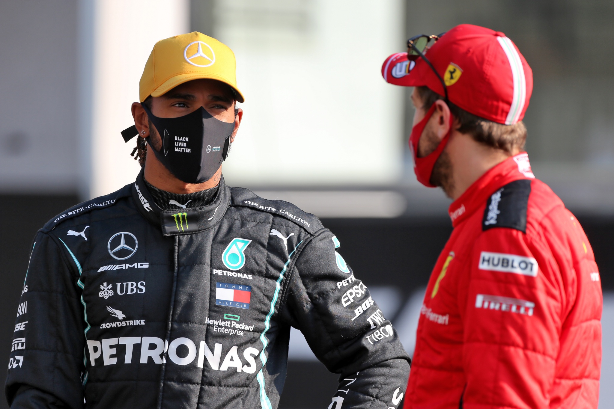 (L to R): Lewis Hamilton (GBR) Mercedes AMG F1 with Sebastian Vettel (GER) Ferrari.