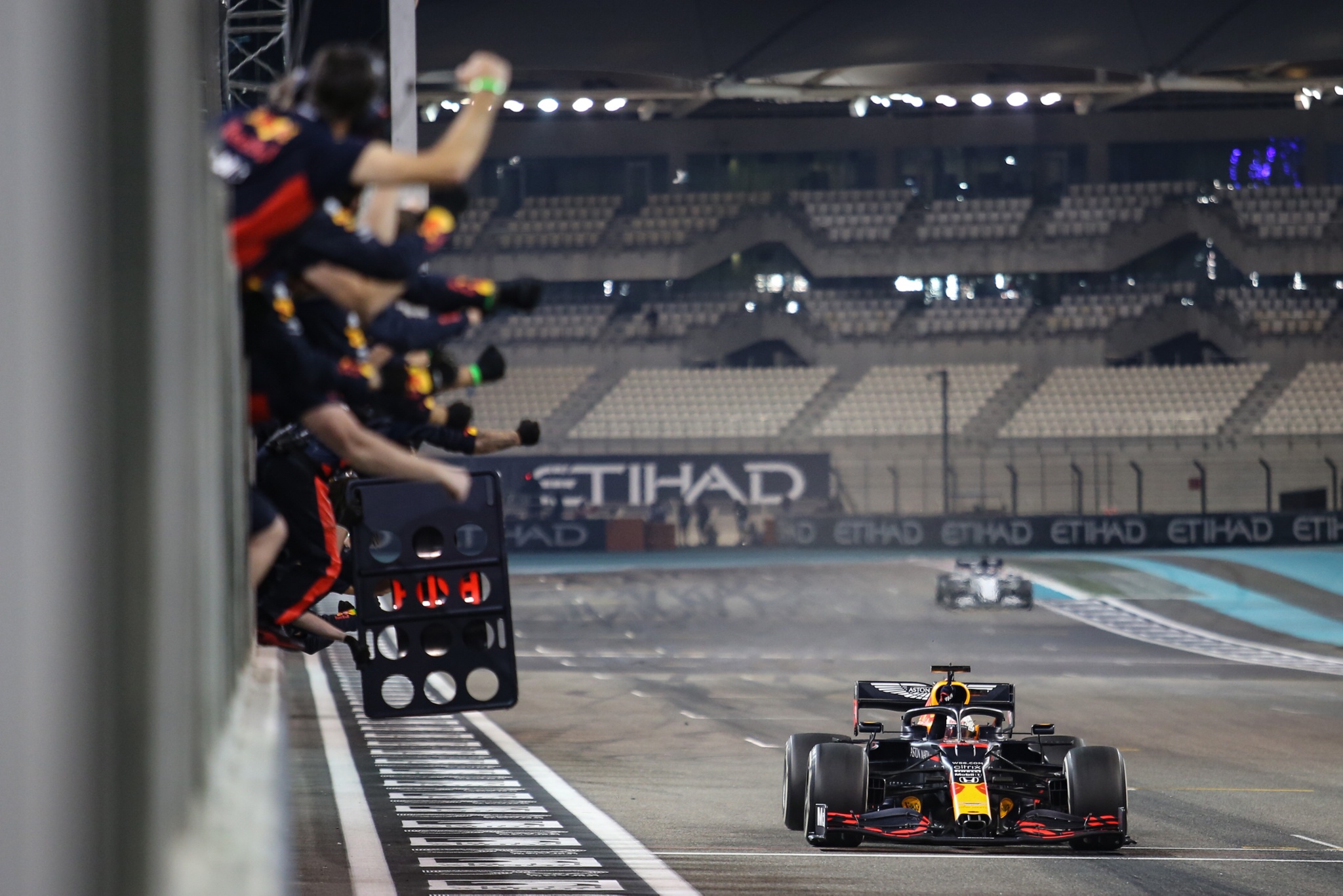 Race winner Max Verstappen (NLD) Red Bull Racing RB16 celebrates as he passes the team at the end of the race.