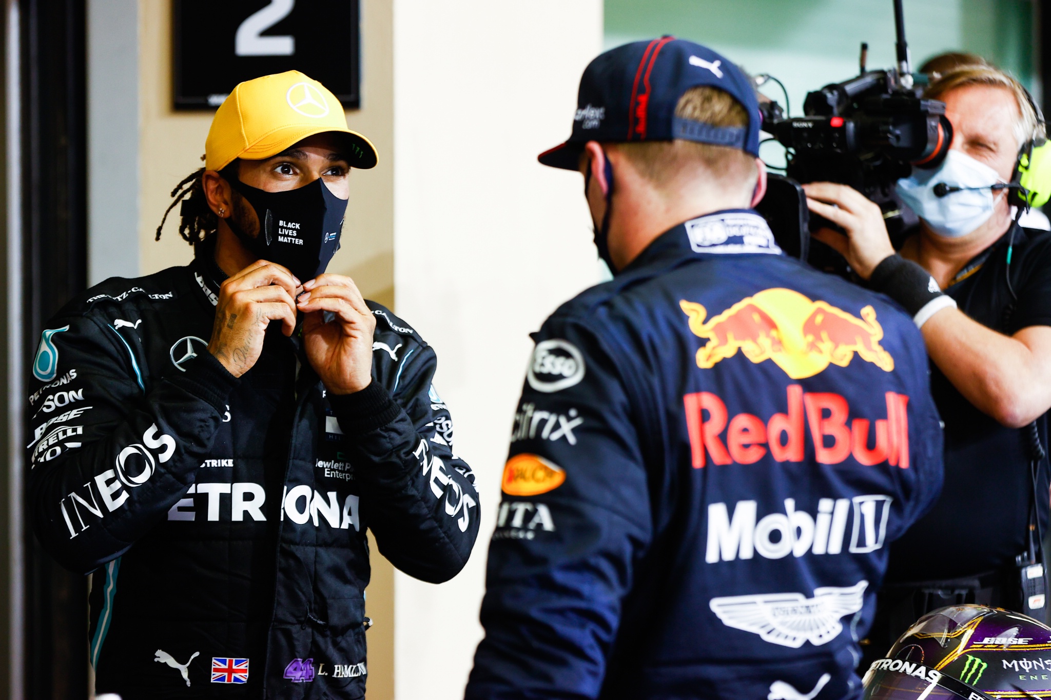 (L to R): Lewis Hamilton (GBR) Mercedes AMG F1 with race winner Max Verstappen (NLD) Red Bull Racing in parc ferme.