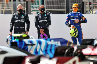 (L to R): Valtteri Bottas (FIN) Mercedes AMG F1; Lewis Hamilton (GBR) Mercedes AMG F1; and Lando Norris (GBR) McLaren.