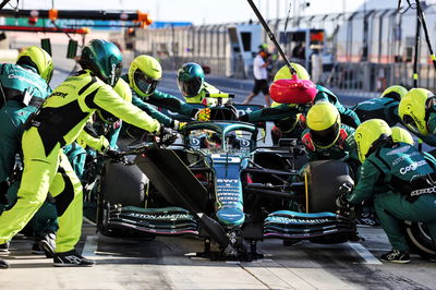 Sebastian Vettel (GER) Aston Martin F1 Team AMR21 practices a pit stop.