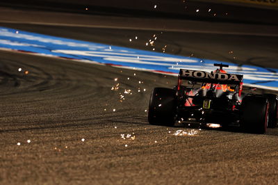 Max Verstappen (NLD) Red Bull Racing RB16B sends sparks flying.