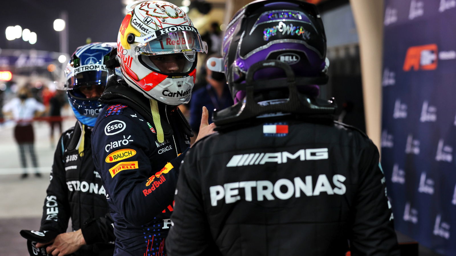 Max Verstappen (NLD) Red Bull Racing and Lewis Hamilton (GBR) Mercedes AMG F1 in qualifying parc ferme.