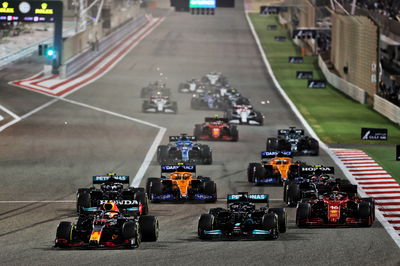 Max Verstappen (NLD) Red Bull Racing RB16B leads Lewis Hamilton (GBR) Mercedes AMG F1 W12 and Charles Leclerc (MON) Ferrari SF-21 at the start of the race.