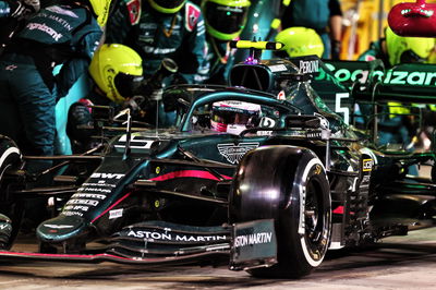 Sebastian Vettel (GER) Aston Martin F1 Team AMR21 makes a pit stop.