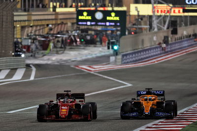 Charles Leclerc (MON) Ferrari SF-21 and Daniel Ricciardo (AUS) McLaren MCL35M battle for position.