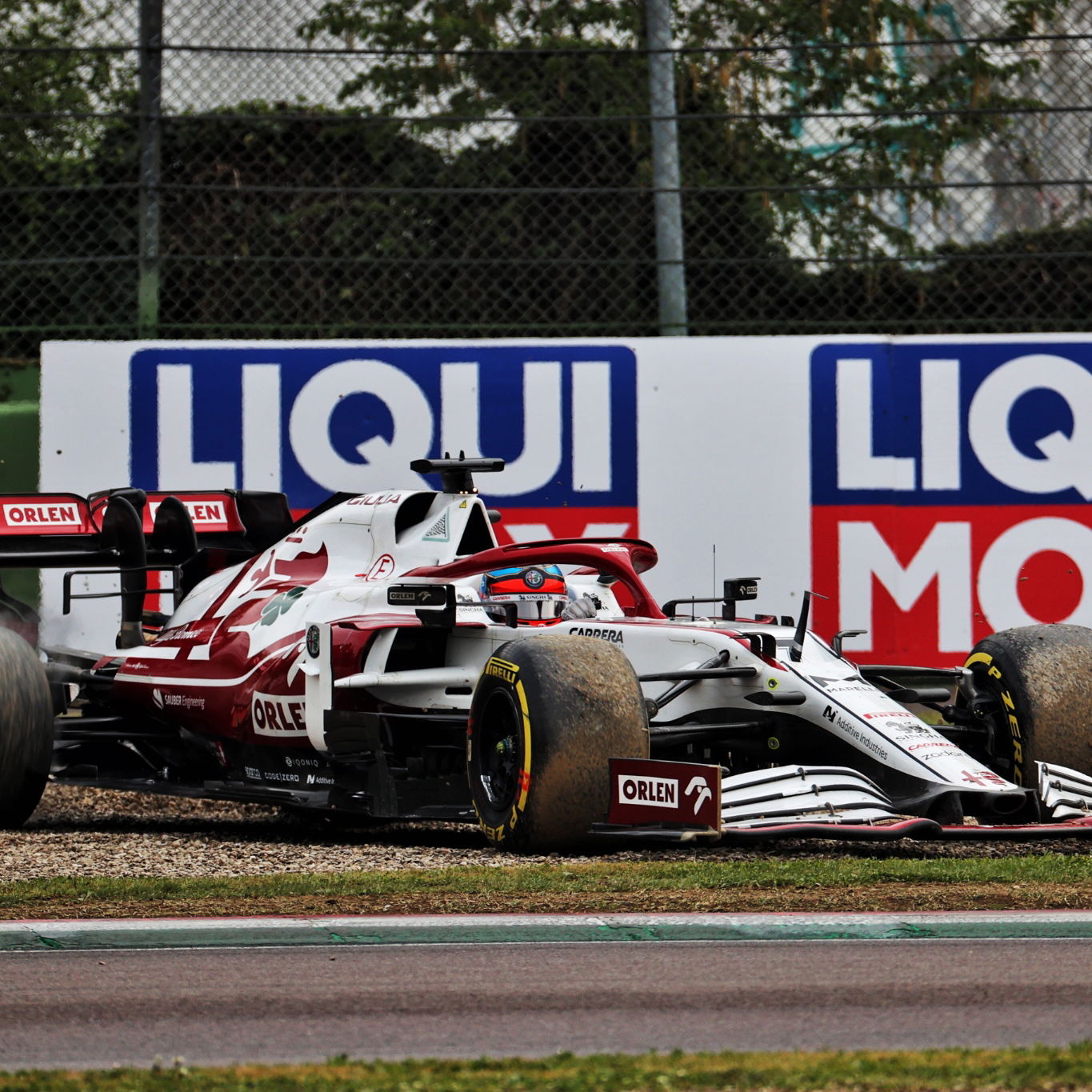 Kimi Raikkonen (FIN) Alfa Romeo Racing C41 rejoins the circuit.