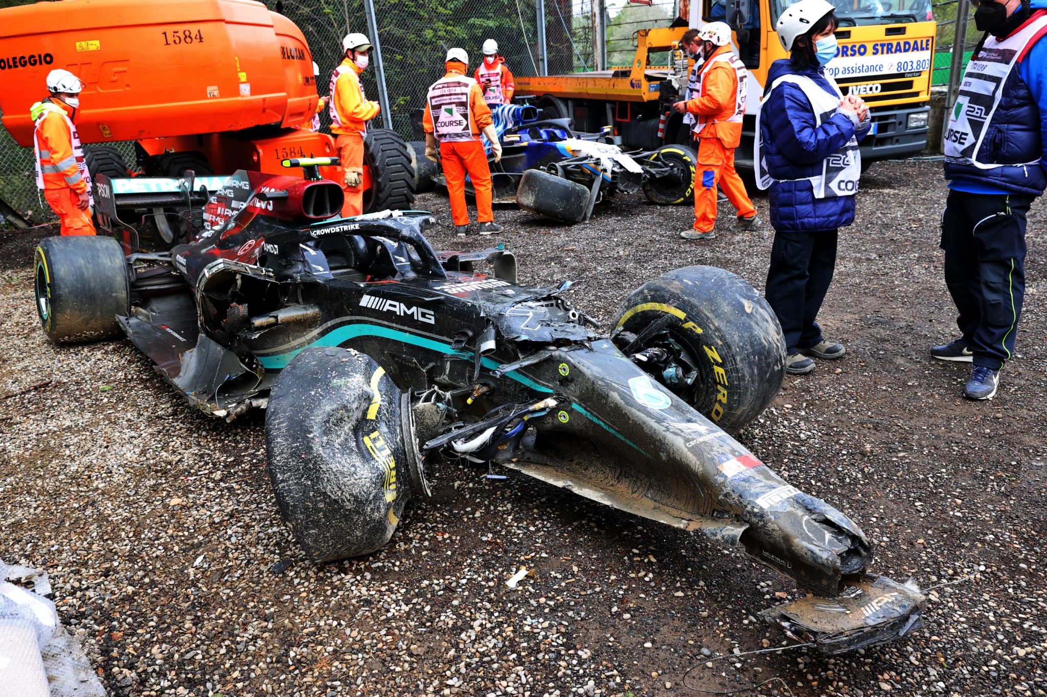 The damaged Mercedes AMG F1 W12 of Valtteri Bottas (FIN) and George Russell (GBR) Williams Racing FW43B, who crashed out of the race.