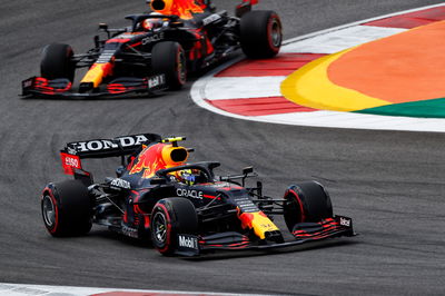 Sergio Perez (MEX) Red Bull Racing RB16B leads team mate Max Verstappen (NLD) Red Bull Racing RB16B.